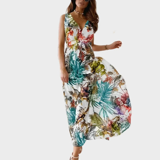 Women's vibrant tropical floral print maxi dress. Breezy, elegant V-neck summer dress for beach or vacation.