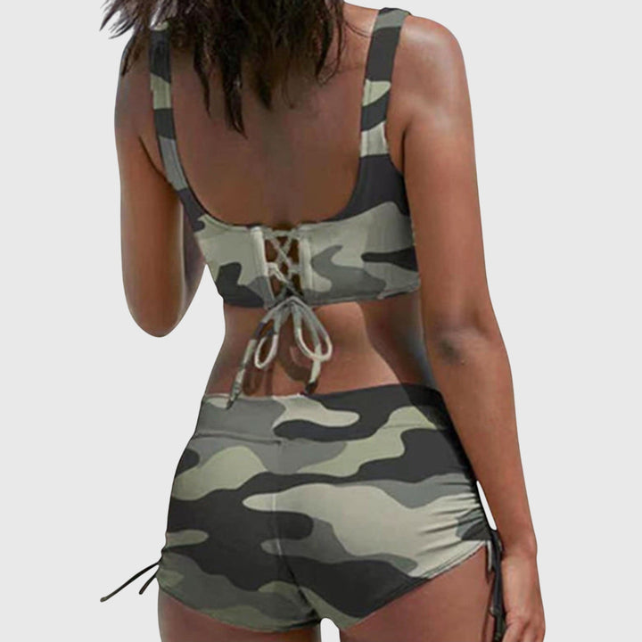 Trendy women's two-piece bikini for vacation wear. Stylish swimwear in vibrant colors, ideal for beach & pool.
