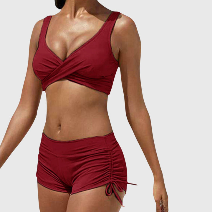 Vibrant women's two-piece bikini swimsuit for sunny beach days & stylish poolside lounging. Trendy summer fashion.