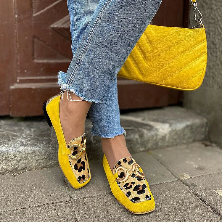 Women's vibrant yellow penny loafers. Comfortable slip-on flats, perfect for casual fashion and everyday wear.