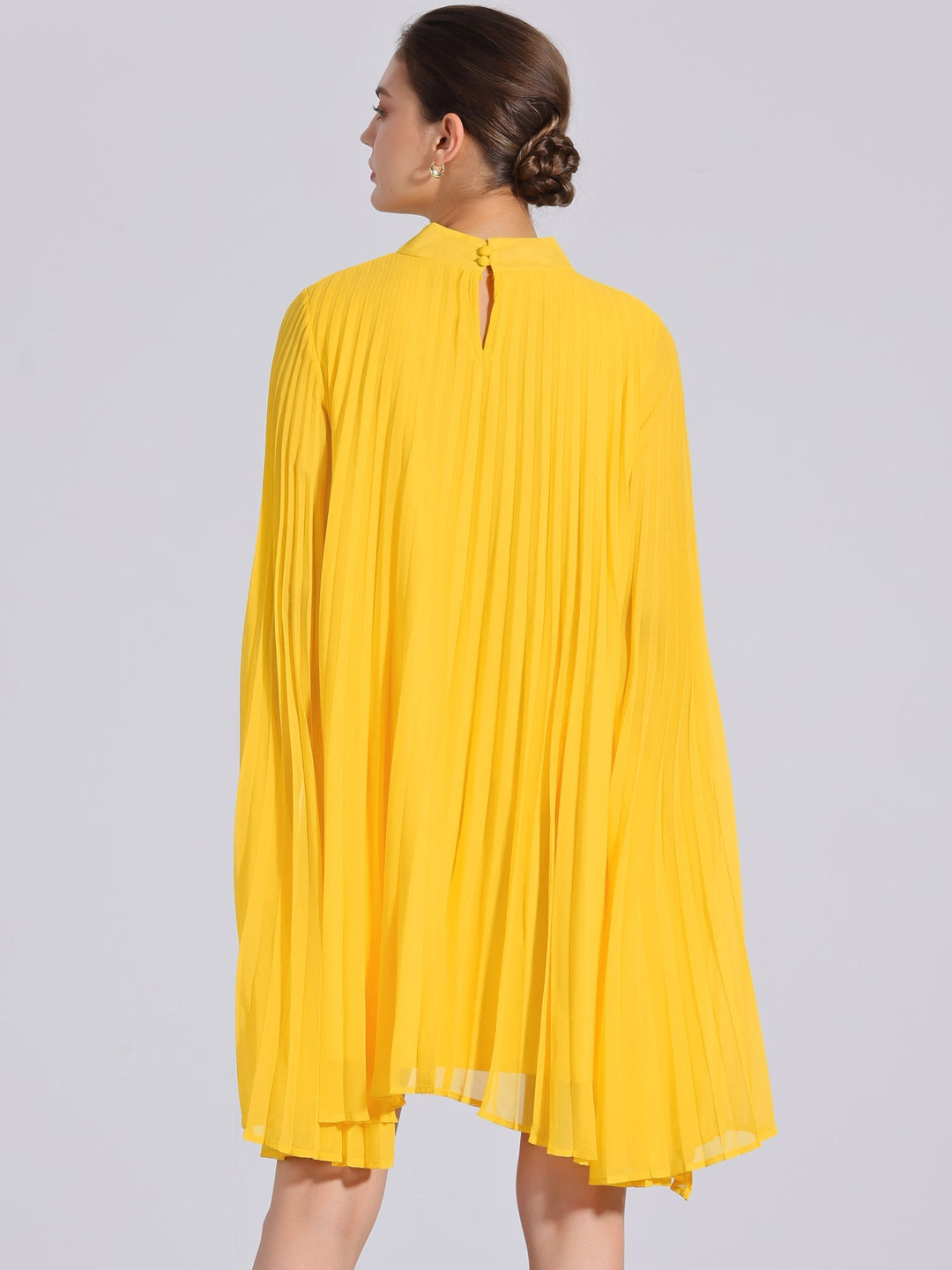 Chic yellow pleated swing dress for women, featuring a flowy style and mock neck, ideal for parties and elegant events.