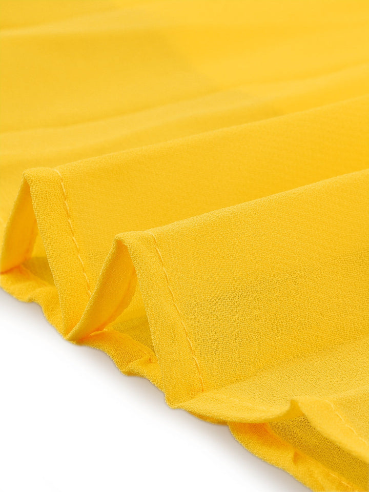 Elegant women's yellow pleated swing dress with cape sleeves & mock neck. Flowy, chic party or summer occasion wear.