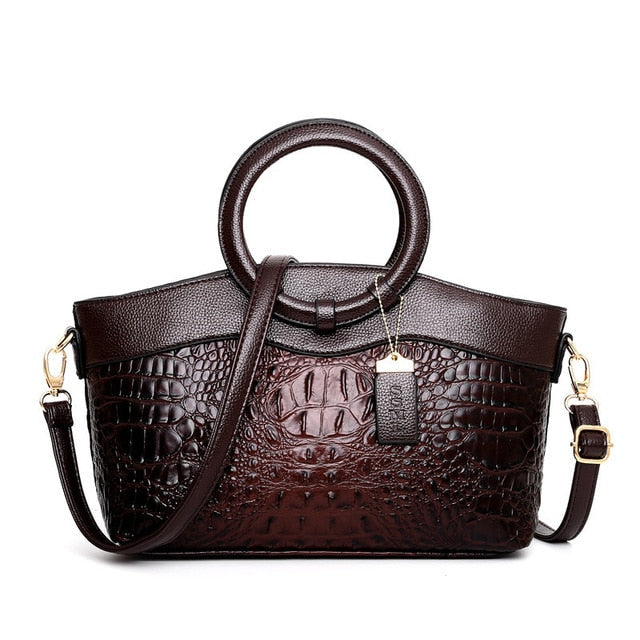Women's versatile vintage style shoulder bag, with an embossed alligator leather look.