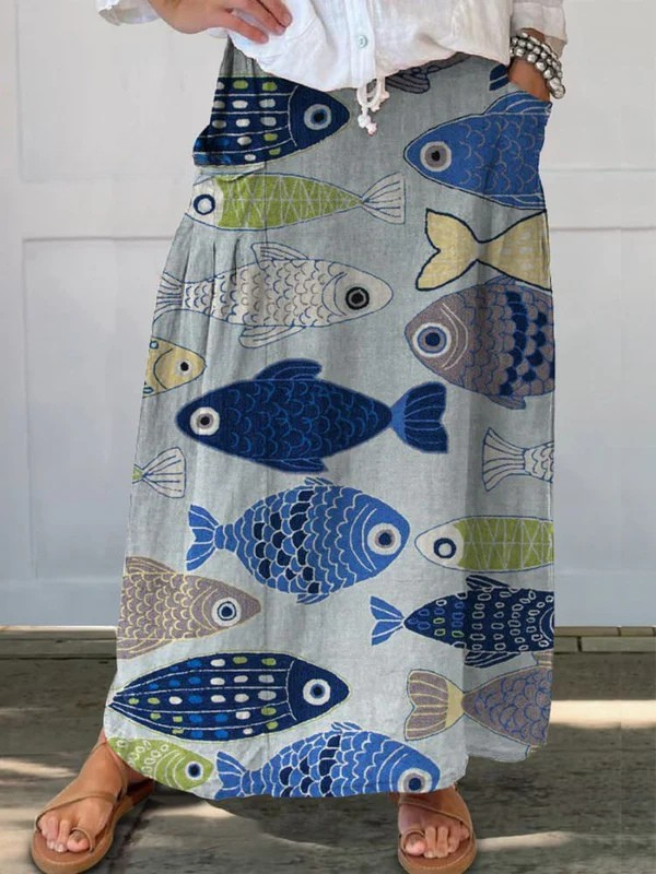 Women's vintage blue A-line midi skirt with unique fish art print & pockets. Comfortable elastic waist summer casual style.