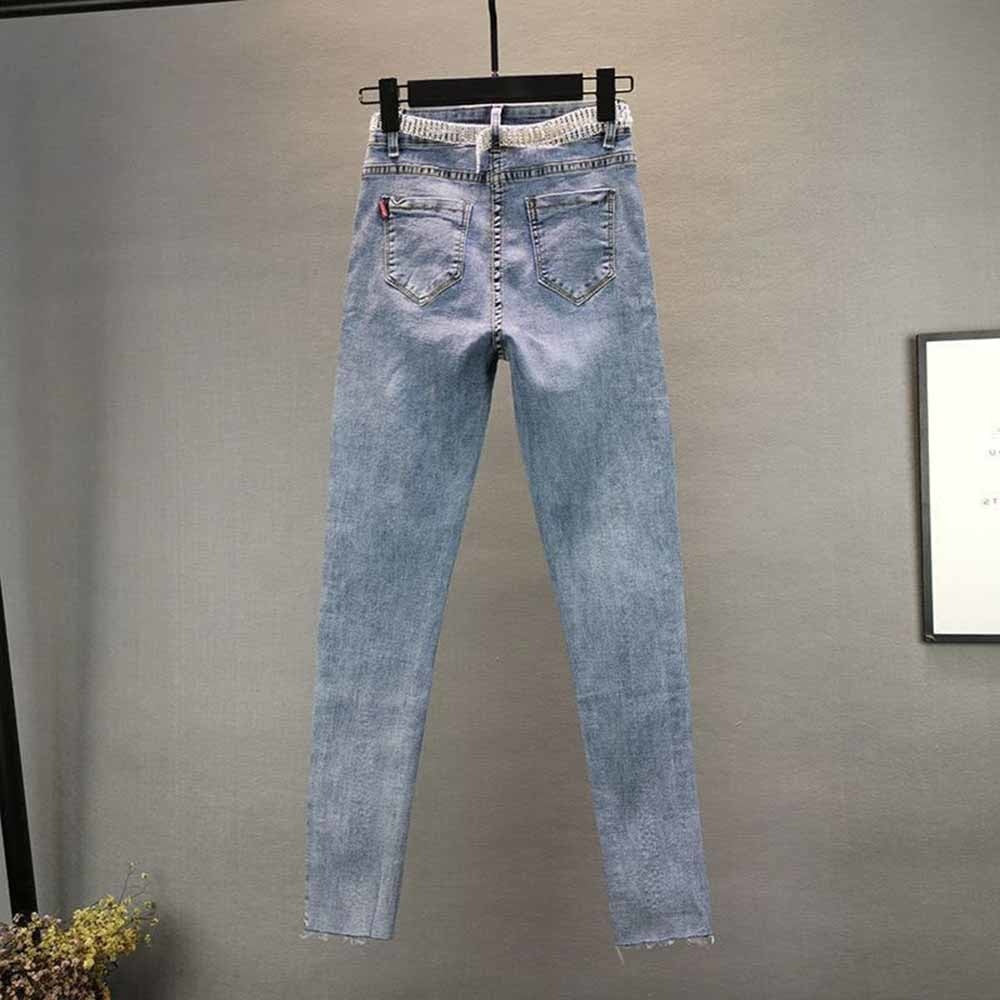 Ladies' high-waist vintage blue slim jeans. Perfect for a classic, comfortable everyday style and versatile looks.