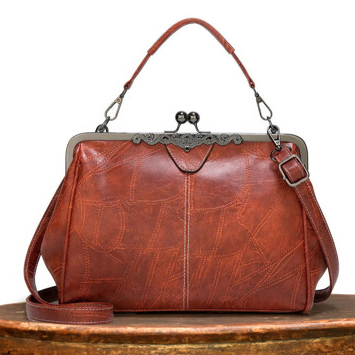 Elegant women's vintage leather cross-body bag, durable and stylish for daily essentials, versatile design.