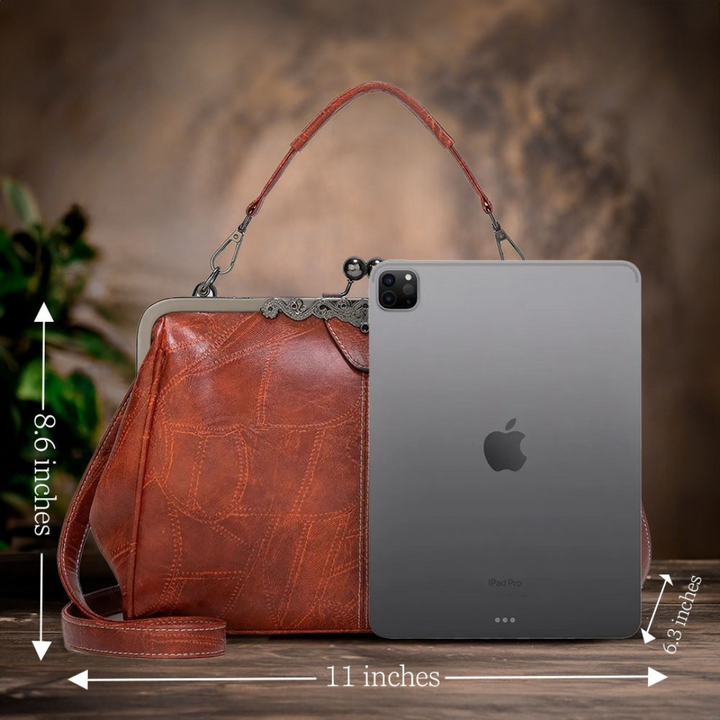 Women's vintage leather shoulder bag carried casually, perfect everyday handbag blending style & function.