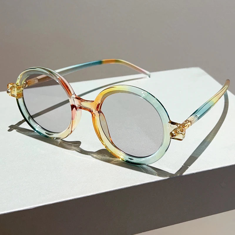 Elegant women's vintage circular sunglasses, quality acetate, UV400 protection.