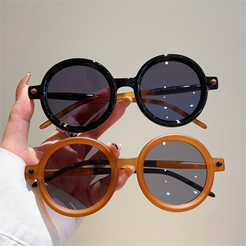 Vintage circular sunglasses for women, offering essential UV400 eye protection.