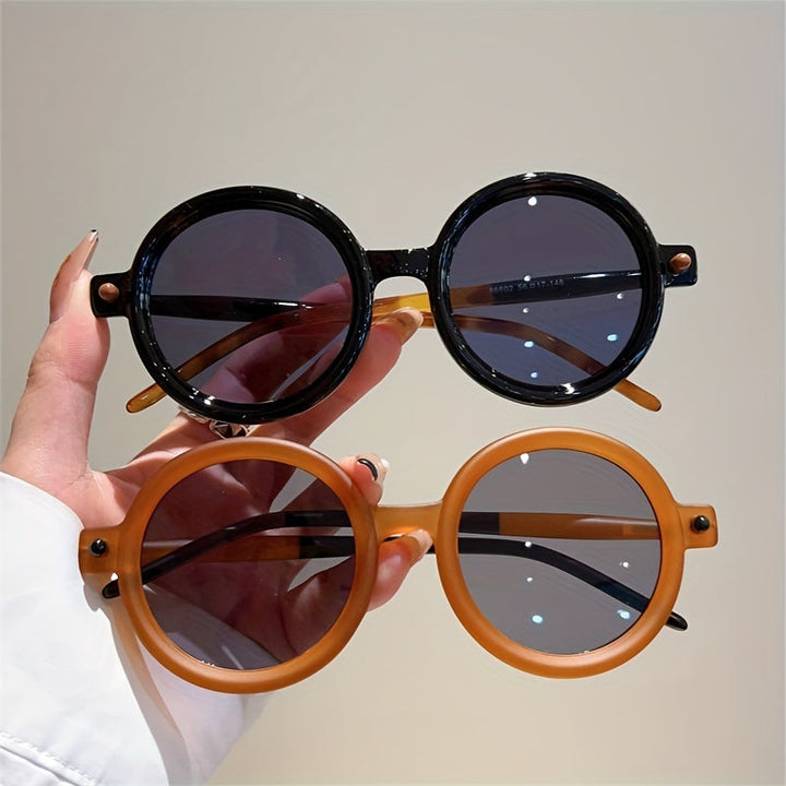 Vintage circular sunglasses for women, offering essential UV400 eye protection.