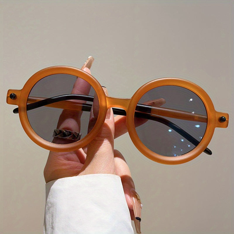 Fashionable women's retro circular sunglasses, elegant acetate eyewear.