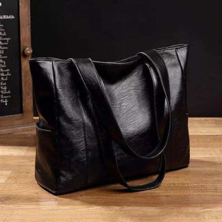 Elegant black vintage style women's tote bag. A classic everyday purse & shoulder bag, fashionable accessory.