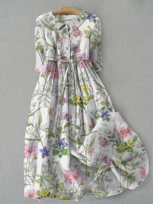Women's vintage floral A-line midi dress with short sleeves, ideal for comfortable summer casual or party wear.