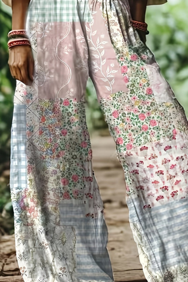 Vibrant floral print women's cropped pants in a relaxed fit, perfect for summer comfort and style.