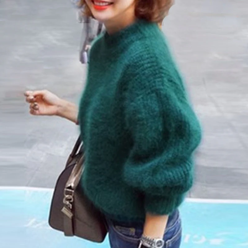 Casual women's loose knit sweater in vintage style, a comfortable wardrobe staple for everyday.