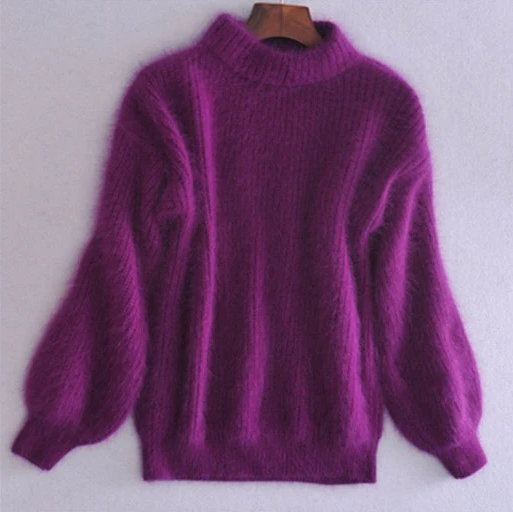 Stylish women's vintage loose fit knit sweater, perfect for a relaxed fall and winter look.