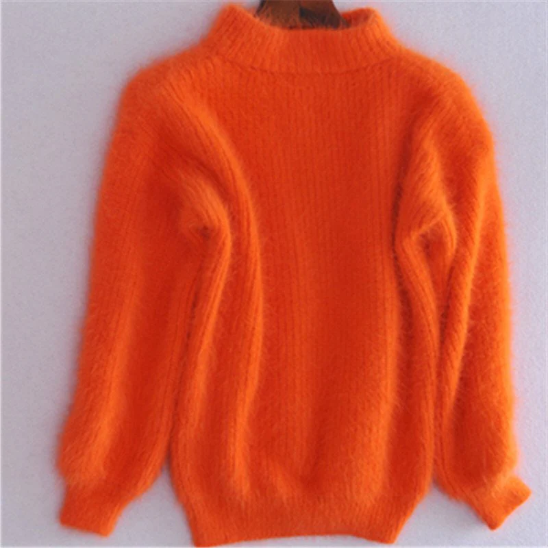 Close-up of the soft knit texture on a women's vintage loose fit solid color sweater.