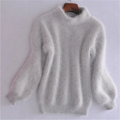 Model wearing a comfortable women's vintage loose knit sweater, ideal for casual fall fashion.