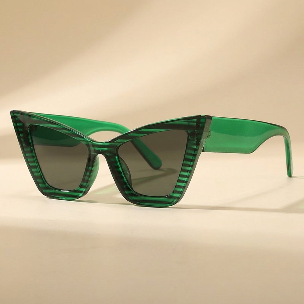 Black vintage oversized cat eye sunglasses for women. Fashionable eyewear with UV400 protection.