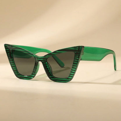 Black vintage oversized cat eye sunglasses for women. Fashionable eyewear with UV400 protection.