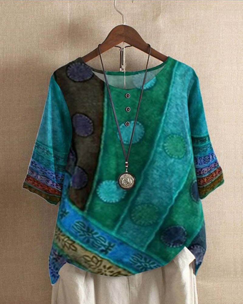 Bohemian style women's tunic blouse, vintage patchwork print, three-quarter sleeves, relaxed fit for travel.