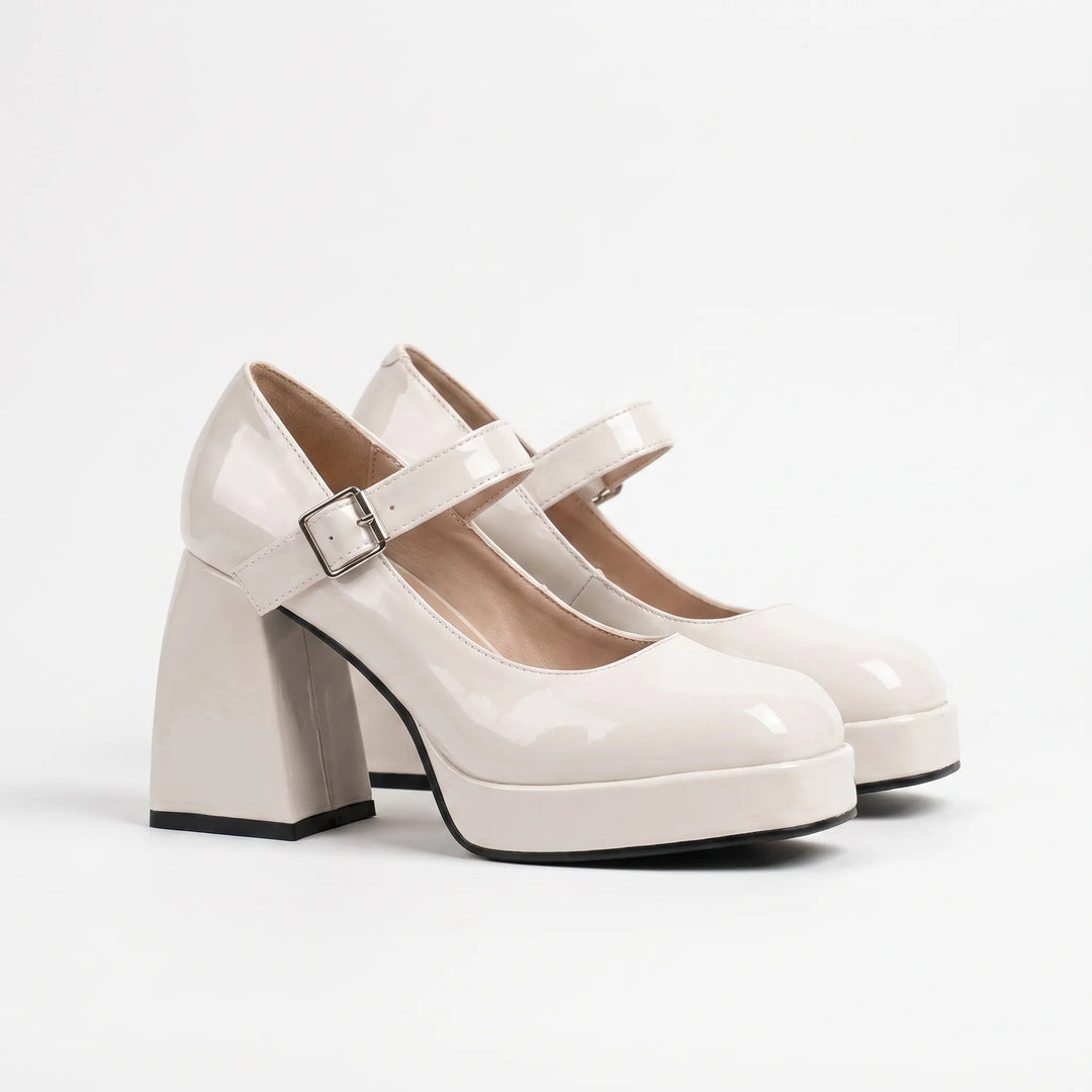 Elegant women's retro Mary Jane platform pumps. Vintage style block heel with secure buckle strap.