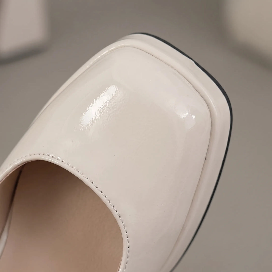 Chic vintage women's platform pumps. Versatile closed-toe high heels with a stable block heel & square toe.
