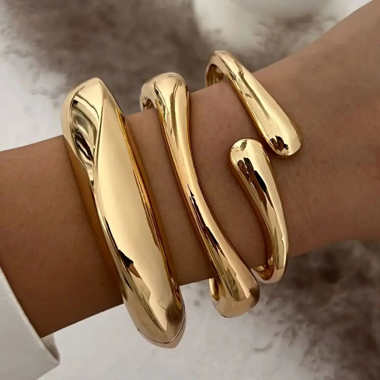 Elegant vintage stackable bracelets set for women, combining gold and silver finishes, perfect fashion jewelry.