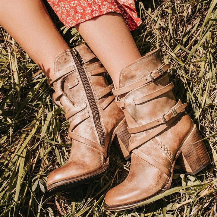 Elegant women's leather vintage ankle boots with a stylish heel, ideal for casual or dress wear.