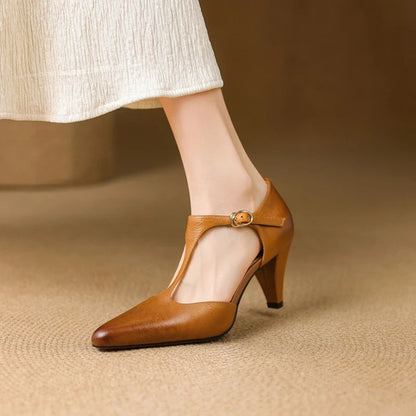 Fashionable women's T-Strap mid-heel pumps. Vintage style classic dress shoes for an elegant look.