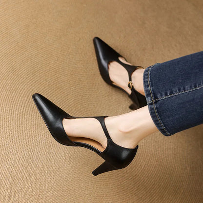 Woman wearing vintage T-Strap mid-heel pumps. Classic elegant dress shoes, comfortable for any occasion.