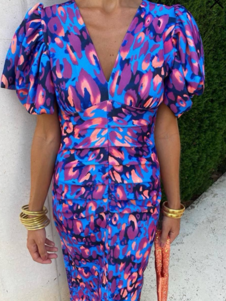Eye-catching vivid ruched midi dress for women, perfect as an elegant cocktail or party dress.