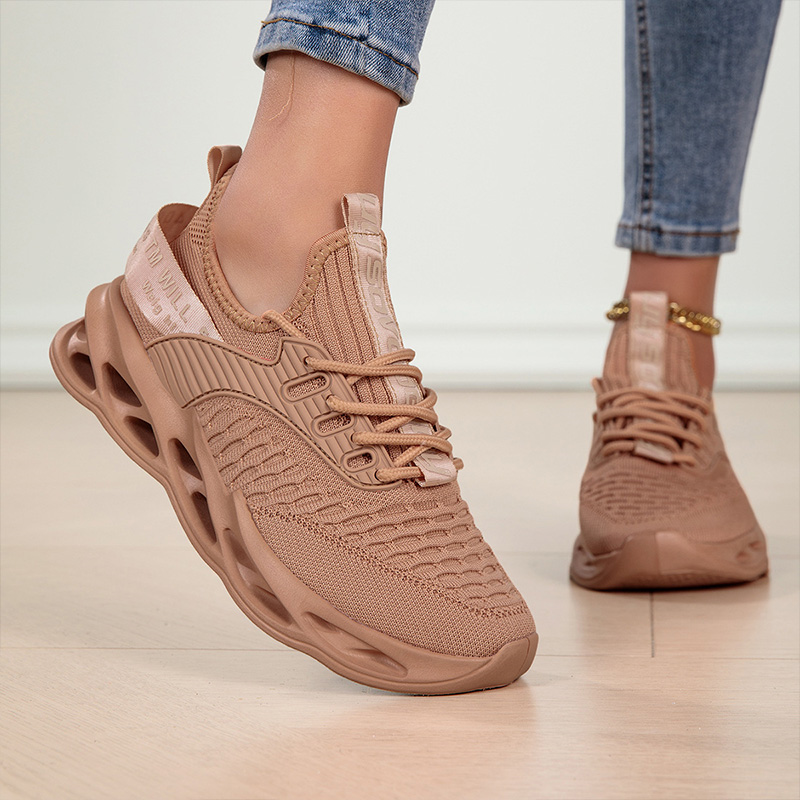 Stylish women's lace-up walking shoes, lightweight design and flexible sole for ultimate comfort.
