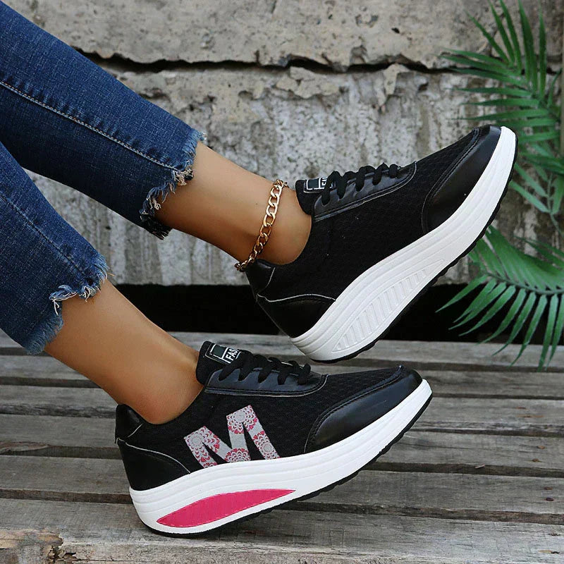 Women's comfortable walking sneakers, featuring breathable fabric and supportive design for all-day wear and activity.