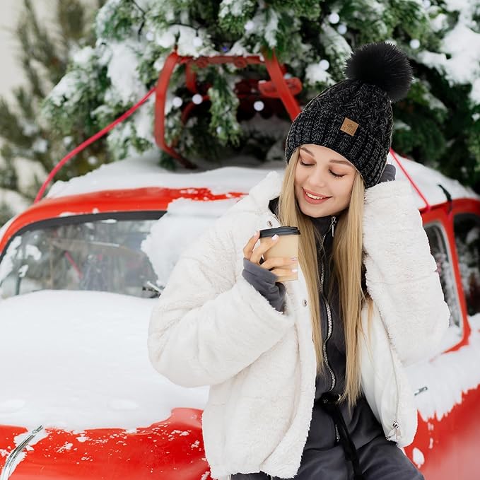 Women's winter cable knit hat (Yvonne), fleece-lined, with a delightful pom-pom for warmth.
