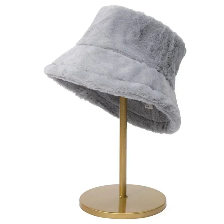 Women's stylish faux rabbit fur bucket hat. A must-have accessory for autumn and winter fashion.