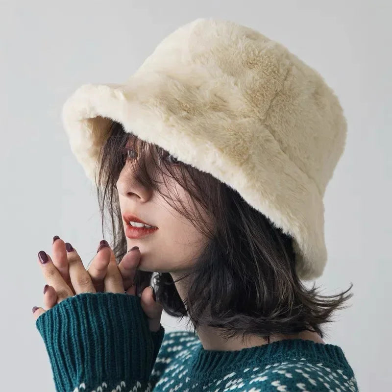Warm and soft faux rabbit fur bucket hat for women. Ideal for a cozy and chic winter look.