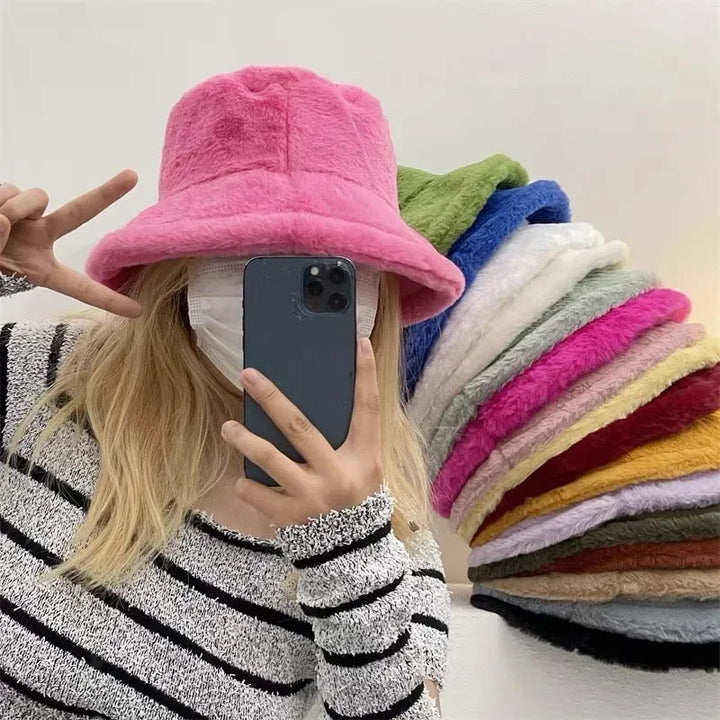 Durable and warm women's faux rabbit fur bucket hat. Enjoy comfort and style all winter long.