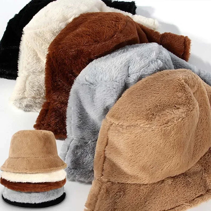 Versatile women's faux rabbit fur bucket hat. Provides warmth and elegance for any cold-weather outfit.