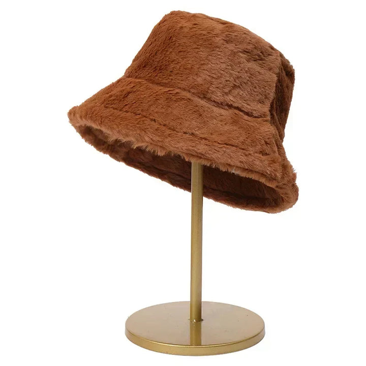 Elegant women's faux rabbit fur bucket hat. A cozy and fashionable accessory for crisp chilly days.