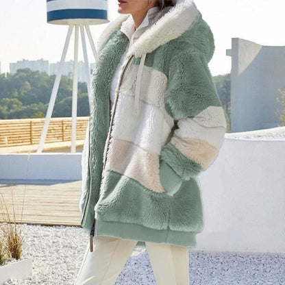 Versatile women's hooded winter coat, combining warmth, style, and everyday functionality.