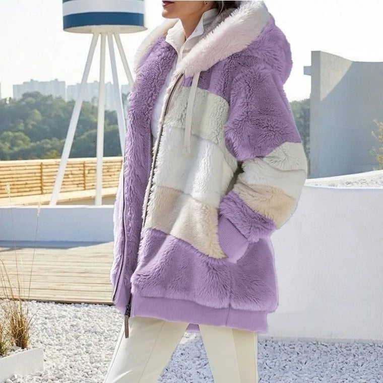 Plush women's hooded winter coat, designed for maximum warmth and everyday comfort.