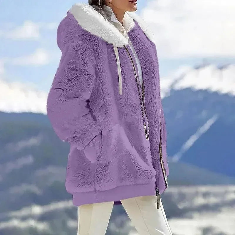 Chic women's hooded winter jacket, a cozy and versatile outerwear for cold weather.