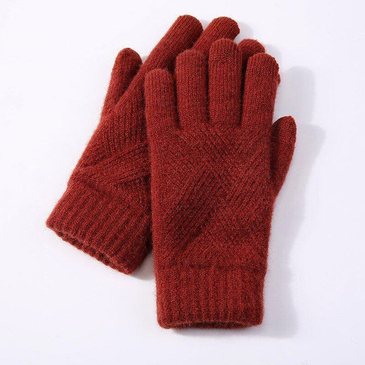 Women's warm knitted gloves with touchscreen function for winter comfort and style.