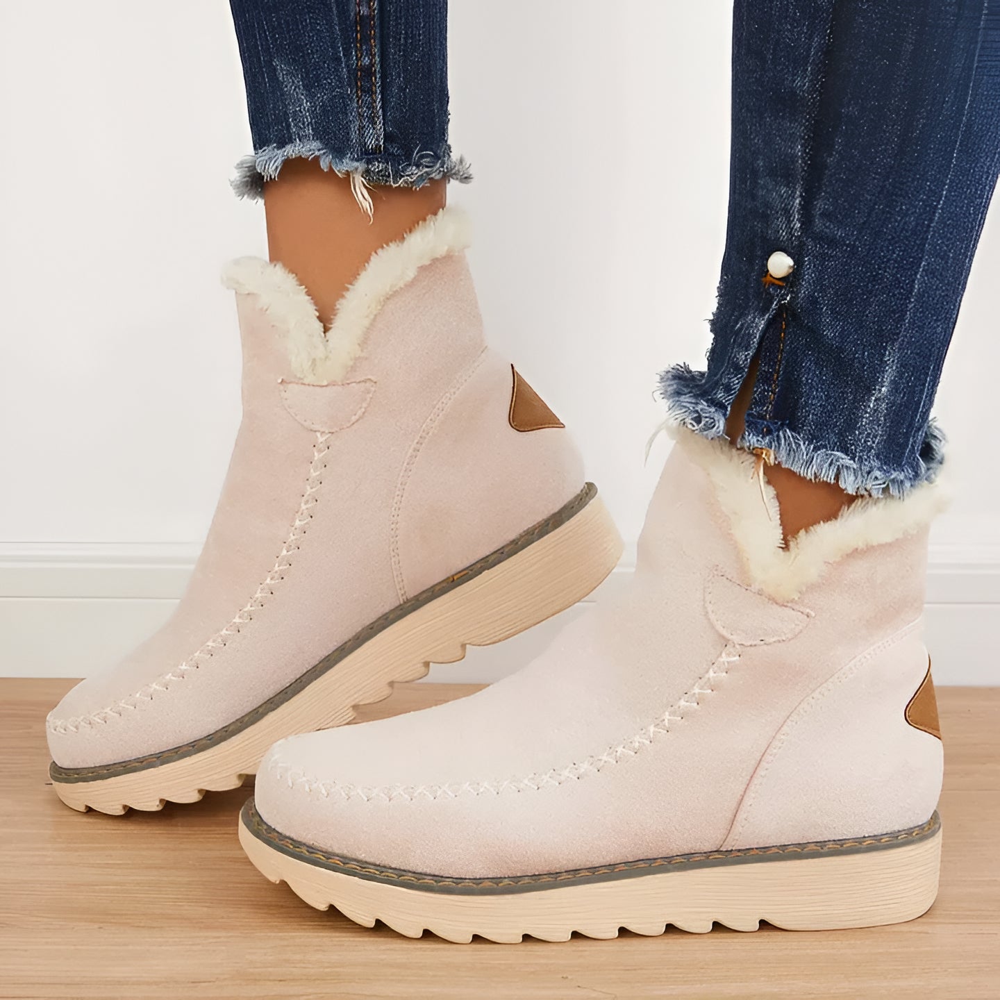 Durable women's non-slip ankle snow boots, designed for warmth, grip & comfort in winter.