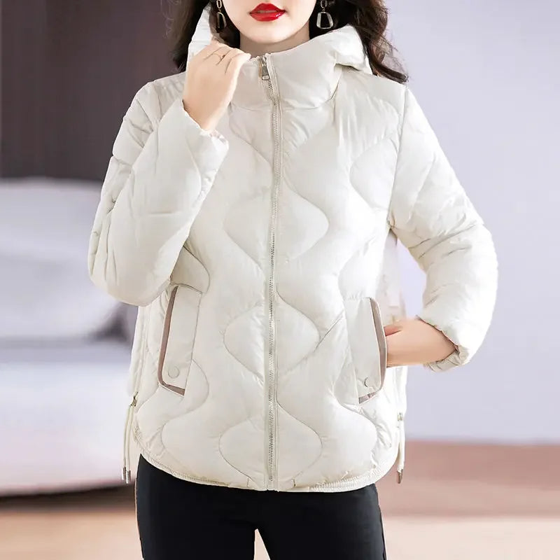 Chic women's quilted puffer jacket, a warm winter outerwear essential for fashion-conscious women.