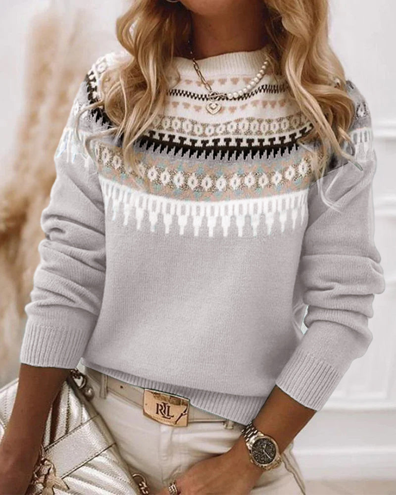 Stylish women's long sleeve pullover sweater, great for layering and casual everyday wear.