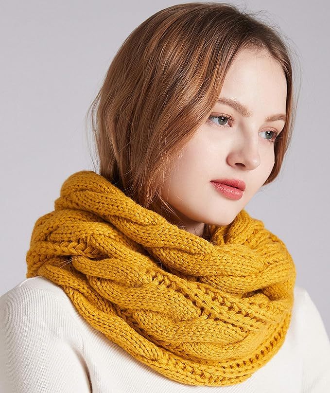 Detailed view of the ultimate soft ribbed knit fabric of a women's warm winter scarf.