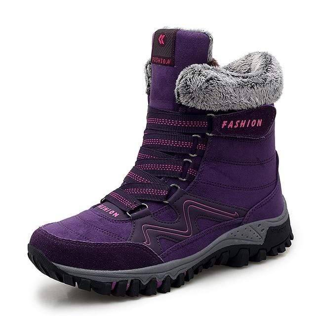 Rugged women's outdoor ankle boots made of suede for warmth and traction in snow