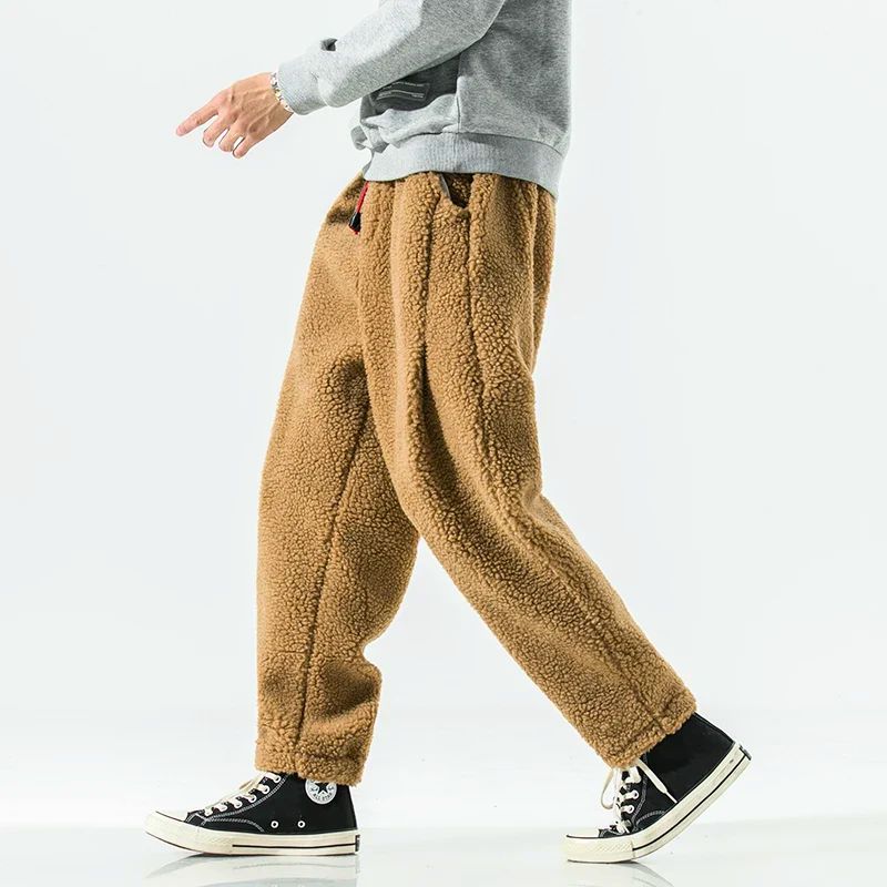 Cozy women's relaxed fit winter trousers, perfect for warmth and casual style in cold weather.